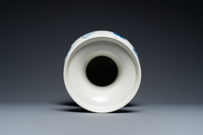 A Chinese blue and white vase with rocks in a wavy sea, Qianlong/Jiaqing