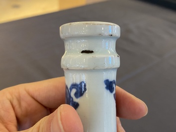 A pair of Chinese blue and white 'peony scroll' pharmacy bottles, Kangxi