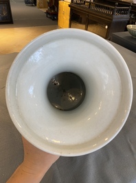 A Chinese blue and white vase with rocks in a wavy sea, Qianlong/Jiaqing