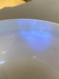 A Chinese blue and white vase with rocks in a wavy sea, Qianlong/Jiaqing