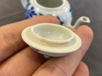 A Chinese blue and white miniature teapot and cover, Kangxi