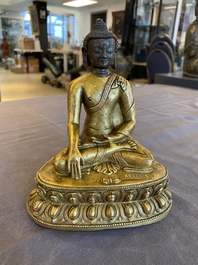 A Sino-Tibetan gilt bronze Buddha, 18th C.
