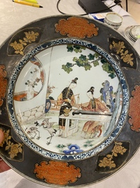 A pair of Chinese famille rose plates with ladies playing music, Yongzheng