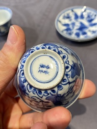 A Chinese blue and white bowl and a pair of cups and saucers, Kangxi