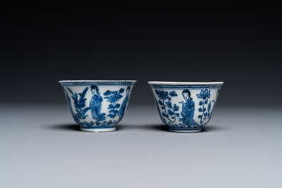 A Chinese blue and white bowl and a pair of cups and saucers, Kangxi