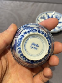 A Chinese blue and white bowl and a pair of cups and saucers, Kangxi
