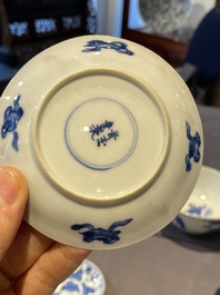 A Chinese blue and white bowl and a pair of cups and saucers, Kangxi