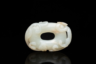 A Chinese 'twin chilong&rsquo; white jade circular pendant, Qing