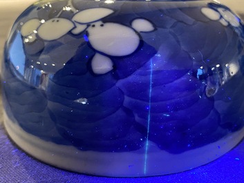 A pair of Chinese blue and white jars and covers, 19th C.