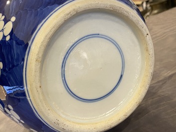 A pair of Chinese blue and white jars and covers, 19th C.