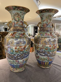 A pair of exceptional Chinese famille rose celadon-ground vases, 19th C.