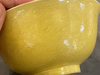 Een Chinese monochrome gele kom met anhua drakendecor, Qianlong merk maar wellicht later