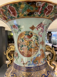 A pair of exceptional Chinese famille rose celadon-ground vases, 19th C.