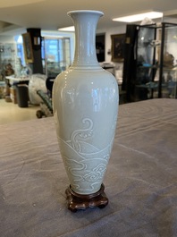 A Chinese celadon-glazed 'sea dragon' vase, Kangxi mark, 19/20th C.