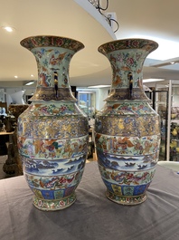 A pair of exceptional Chinese famille rose celadon-ground vases, 19th C.