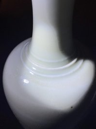 A Chinese celadon-glazed 'sea dragon' vase, Kangxi mark, 19/20th C.