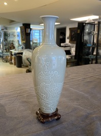 A Chinese celadon-glazed 'sea dragon' vase, Kangxi mark, 19/20th C.