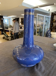 A Chinese gilt-decorated powder-blue-bottle vase, Kangxi mark but probably later