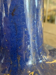 A Chinese gilt-decorated powder-blue-bottle vase, Kangxi mark but probably later