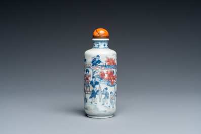 A Chinese blue, white and copper-red snuff bottle, 19th C.