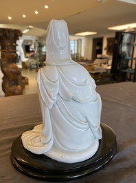 A Chinese Dehua blanc de Chine figure of Guanyin, He Zhang Yong Yin 何章用印 mark, Kangxi