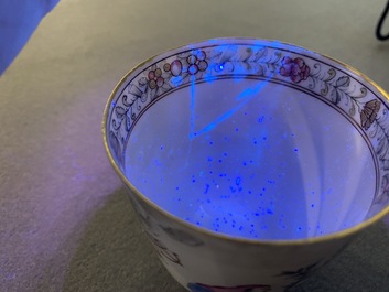 A Chinese famille rose 'erotical subject' cup and saucer, Yongzheng/Qianlong