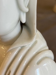 A Chinese Dehua blanc de Chine figure of Guanyin, He Zhang Yong Yin 何章用印 mark, Kangxi
