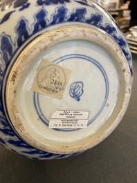 A Chinese blue and white bottle vase with floral design, Kangxi