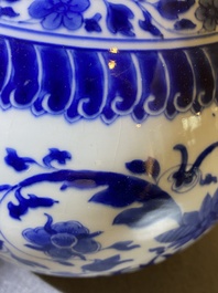A Chinese blue and white bottle vase with floral design, Kangxi