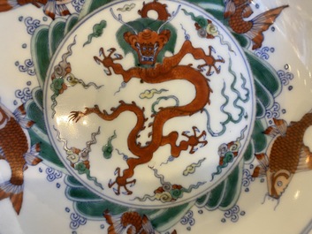 A pair of Chinese doucai 'dragon' plates, Chenghua mark, Kangxi