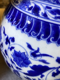 A Chinese blue and white bottle vase with floral design, Kangxi