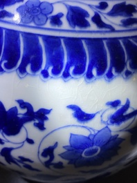 A Chinese blue and white bottle vase with floral design, Kangxi