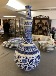 A Chinese blue and white bottle vase with floral design, Kangxi