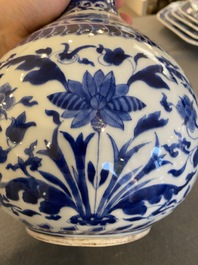 A Chinese blue and white bottle vase with floral design, Kangxi