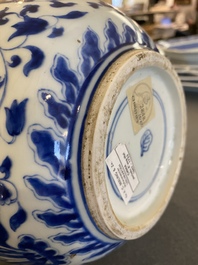 A Chinese blue and white bottle vase with floral design, Kangxi