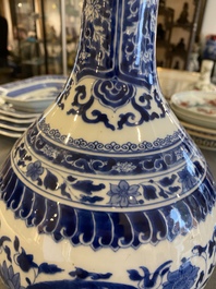 A Chinese blue and white bottle vase with floral design, Kangxi
