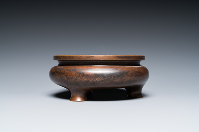 A Chinese bronze tripod censer, Xuande mark, Kangxi/Qianlong
