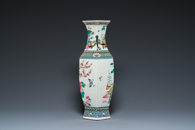 A hexagonal Chinese famille rose vase with antiquities and peacocks, 19th C.