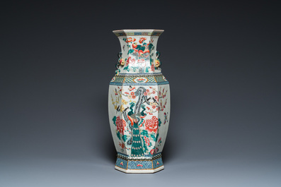 A hexagonal Chinese famille rose vase with antiquities and peacocks, 19th C.