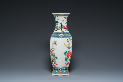 A hexagonal Chinese famille rose vase with antiquities and peacocks, 19th C.