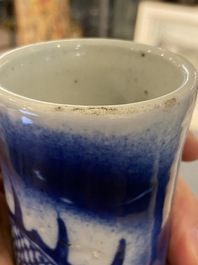 A Chinese blue and white 'dragons' bottle vase, 19th C.