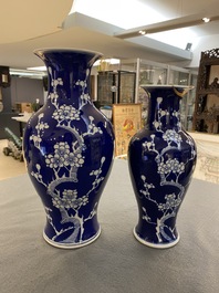 Two Chinese blue and white 'prunus' vases with kintsugi repairs, Qianlong mark, 20th C.