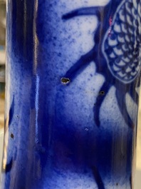 A Chinese blue and white 'dragons' bottle vase, 19th C.