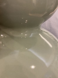 A Chinese monochrome celadon-glazed double gourd vase, 18/19th C.