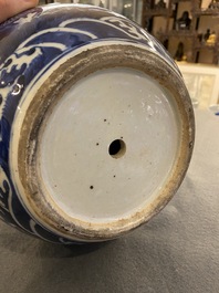 A Chinese blue and white 'dragons' bottle vase, 19th C.