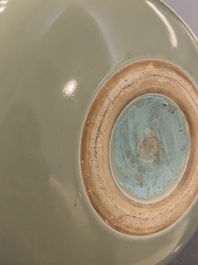 A Chinese monochrome celadon-glazed double gourd vase, 18/19th C.