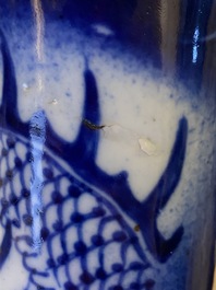 A Chinese blue and white 'dragons' bottle vase, 19th C.