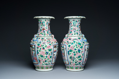 A pair of Chinese famille rose 'court scene' vases, 19th C.