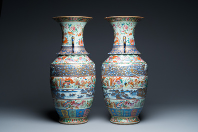 A pair of exceptional Chinese famille rose celadon-ground vases, 19th C.