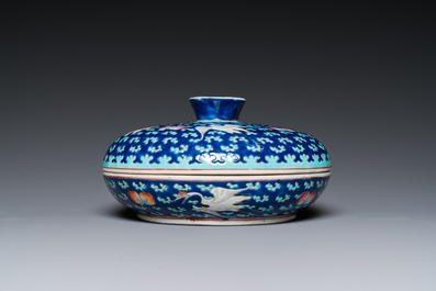 A Chinese famille rose blue-ground spice box and cover for the Straits or Peranakan market, 19th C.